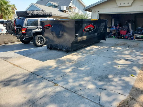 Roll off dumpster in driveway